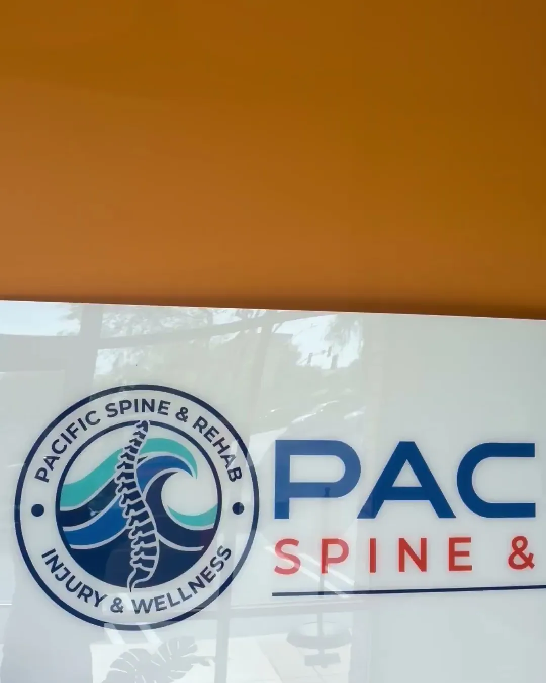 Pacific Spine & Rehab logo wall in the Carlsbad office lobby Pacific Spine & Rehab logo wall in the Carlsbad office lobby